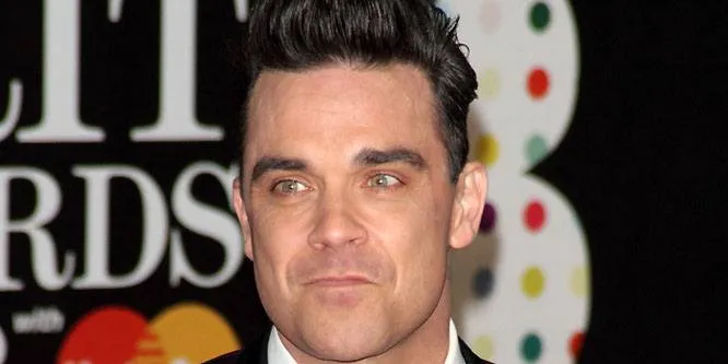 Robbie Williams birthday on February 13, 1974